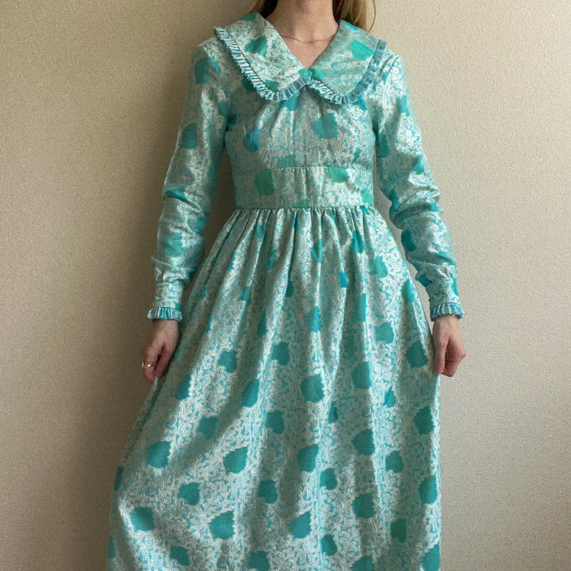 Seasonal Clearance 1970s Turquoise Maxi Dress With Silver Paisley Pattern (XS)