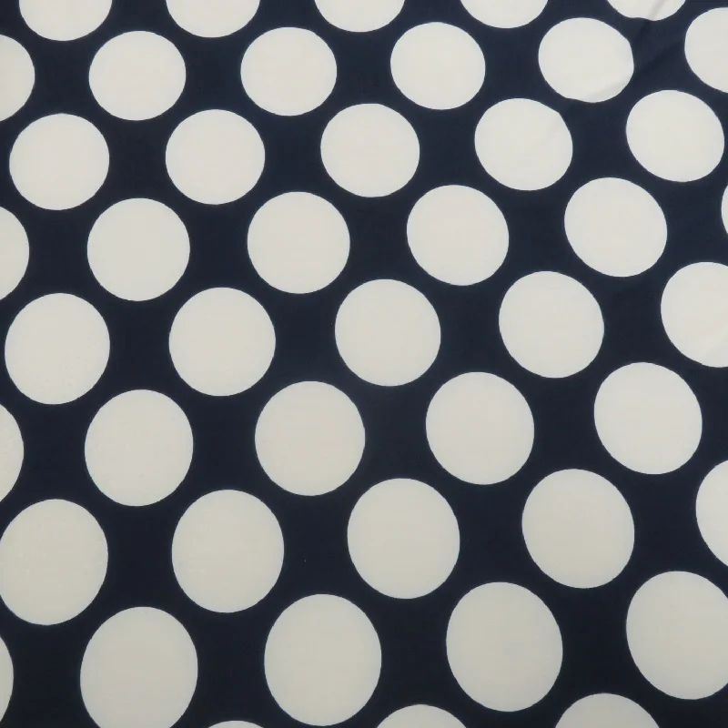 While Supplies Last Large White Polka Dots on a Navy Blue Background Printed Spandex Stretch Fabric
